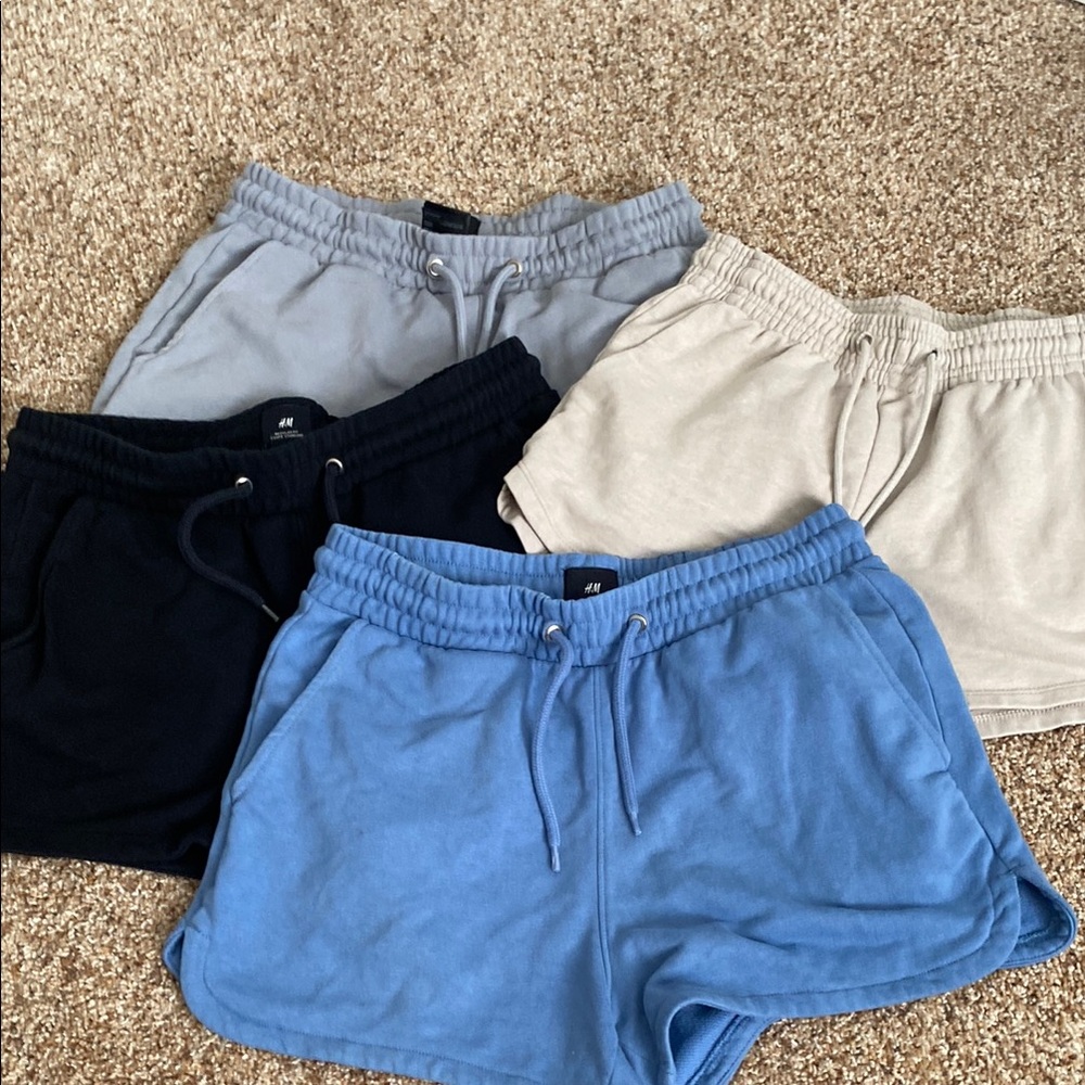 Set of Four Casual Shorts in Blue, Black, Gray, and Cream